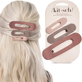 Kitsch flat claw in a purse showing travel-friendly compactness and convenience