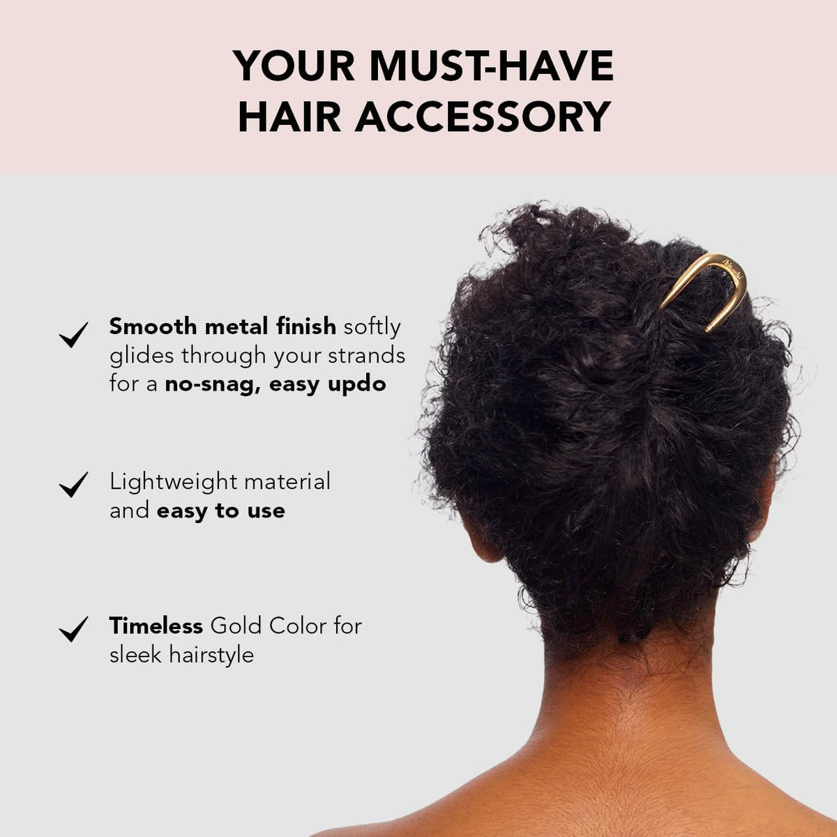 Kitsch hair pin inserted in a bun demonstrating stable all-day hold
