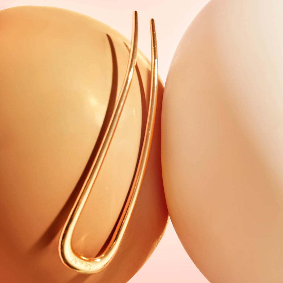 Kitsch hair pin texture detail highlighting polished metal durability