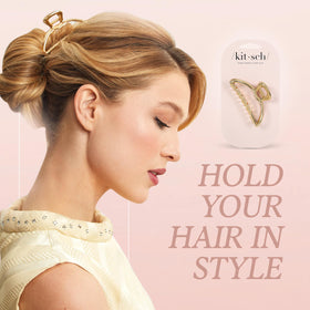 Kitsch clip beside a coin to show scale and travel-friendly compact size