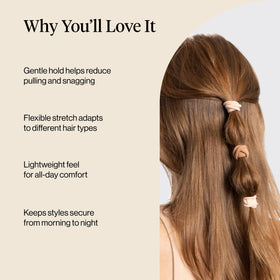 Kitsch hair tie stretched between fingers demonstrating strong flexible hold