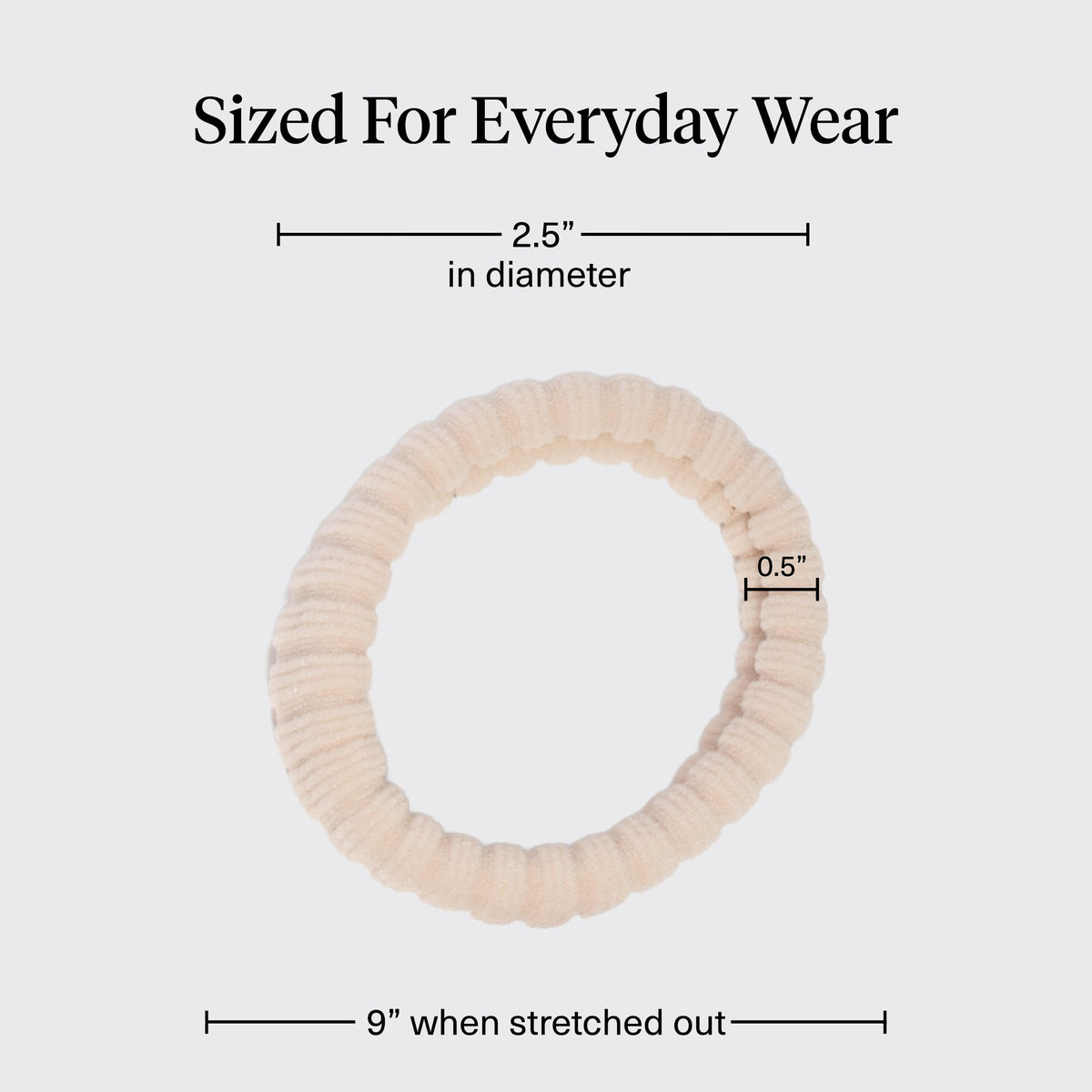 Kitsch hair tie securing a high ponytail demonstrating crease-free styling
