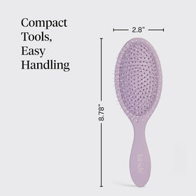 Kitsch brush in use on wet hair demonstrating reduced breakage benefit