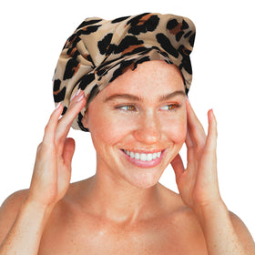 Kitsch leopard cap styled in bathroom to show fashionable self-care