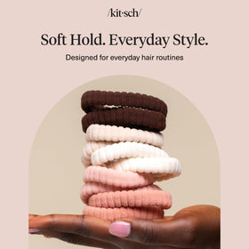 Kitsch hair ties on bathroom counter in lifestyle scene showing everyday use