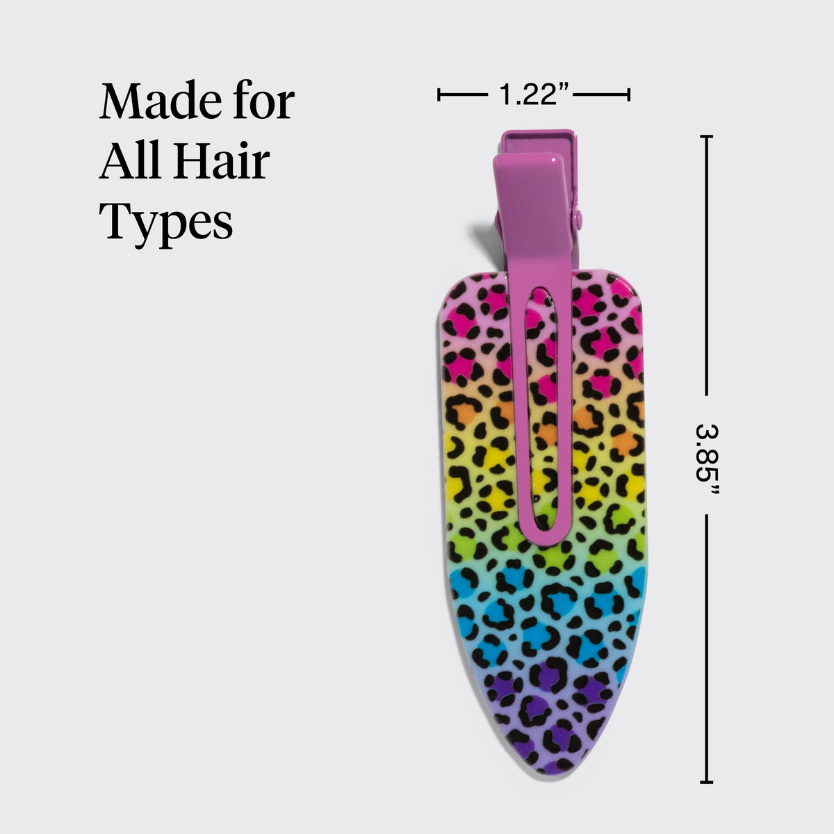 Kitsch Lisa Frank holding thick hair section showing crease-free benefit