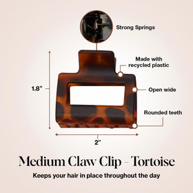 Kitsch medium clip securing a casual updo demonstrating all-day hold