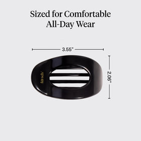 Kitsch clip in hand showing medium scale and easy portability for travel