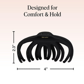 Kitsch Octopus clip held in hand to show large size and easy use