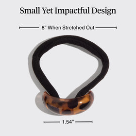 Kitsch cuffs styled along a braid adding shine and decorative accents