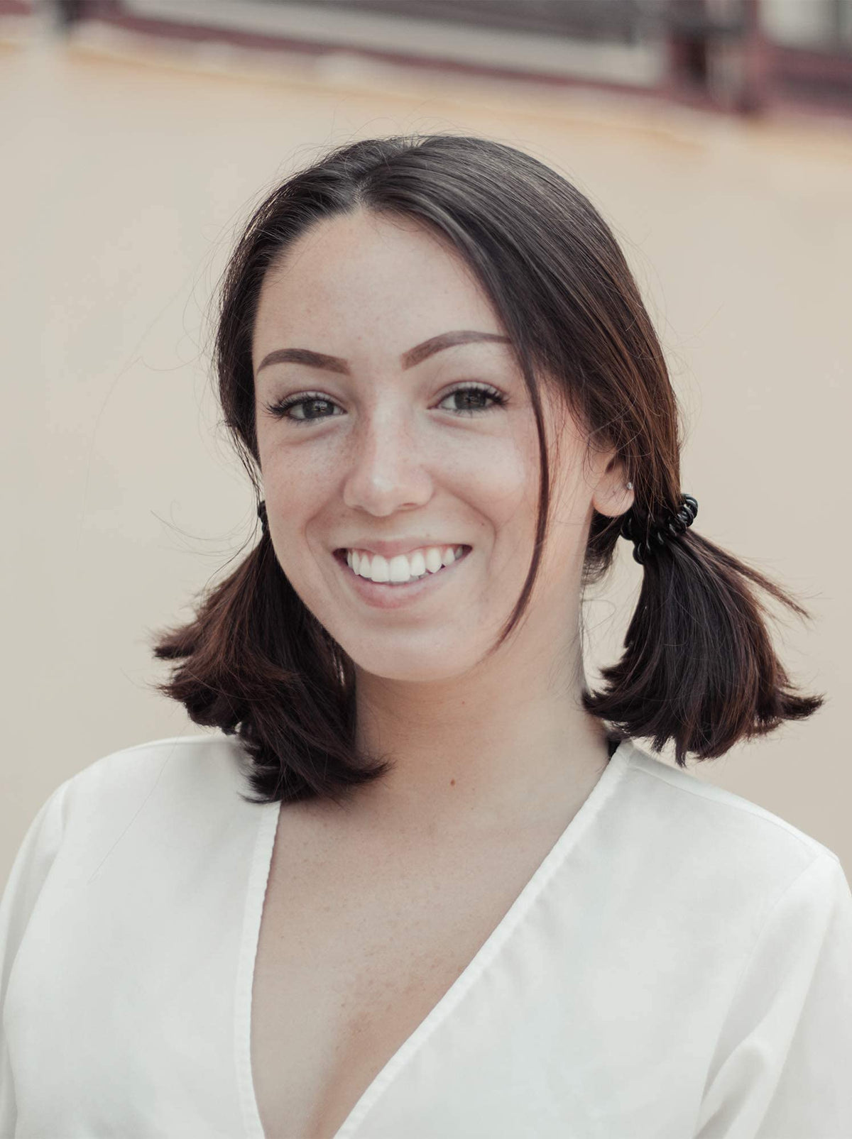Kitsch hair tie securing a high ponytail, secure crease-free hold