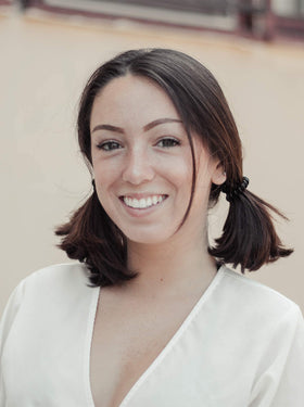 Kitsch hair tie securing a high ponytail, secure crease-free hold