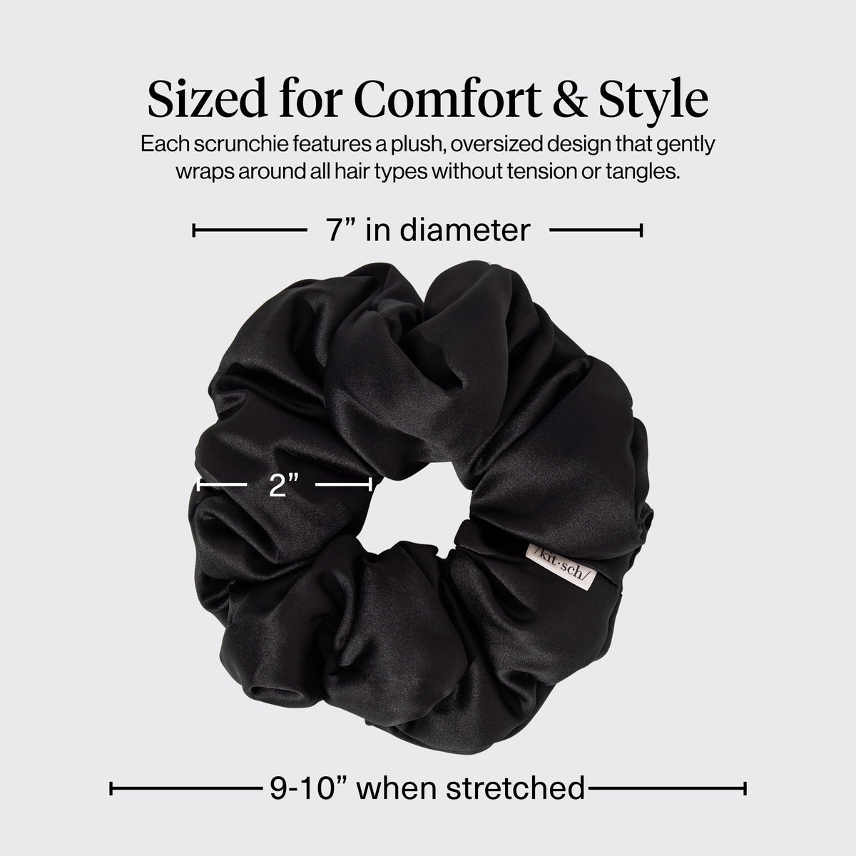 Kitsch black scrunchie holding a ponytail with comfy secure hold