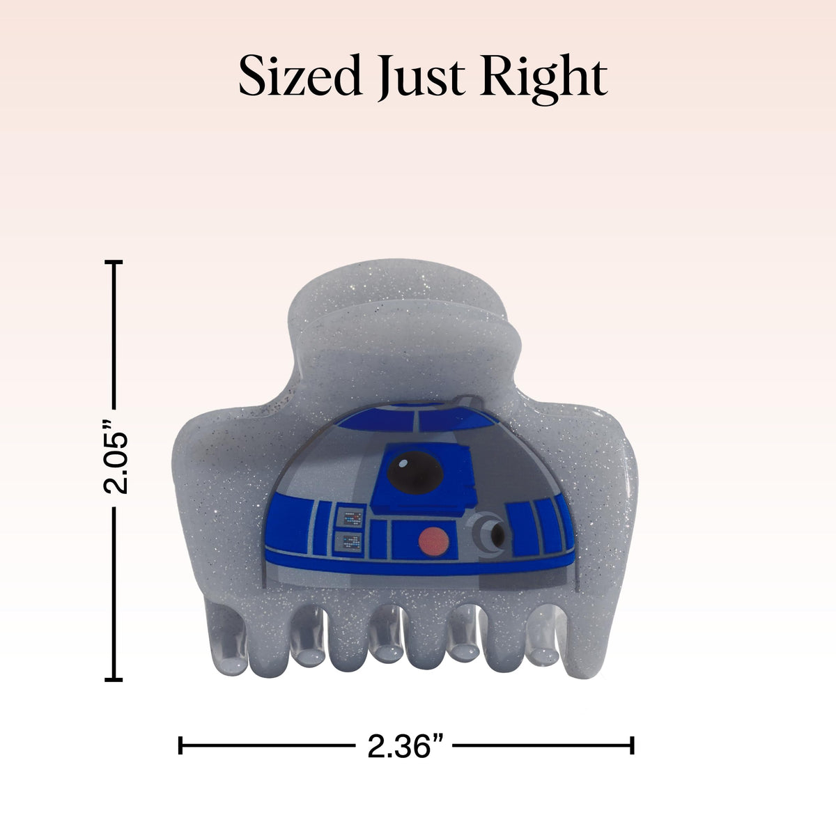 Kitsch R2‑D2 clip holding half‑up hairstyle for effortless styling