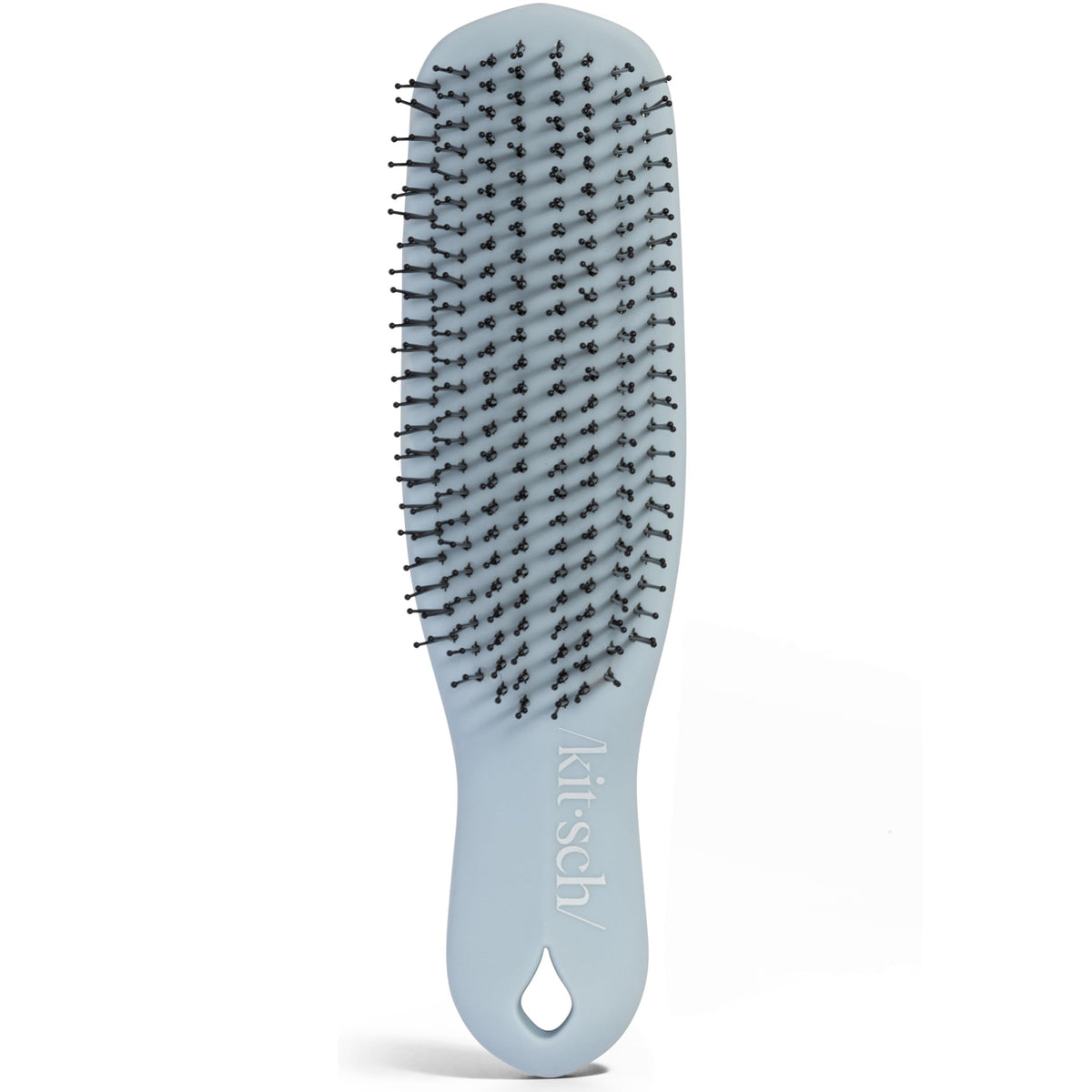 Kitsch close-up of thin nylon bristles demonstrating gentle exfoliation benefit
