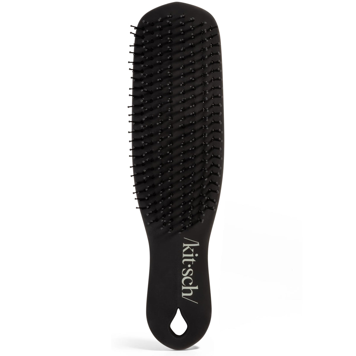 Kitsch close-up of thin flexible bristles lifting residue and protecting scalp