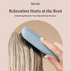 Kitsch brush styled on bathroom vanity to convey elevated self-care ritual