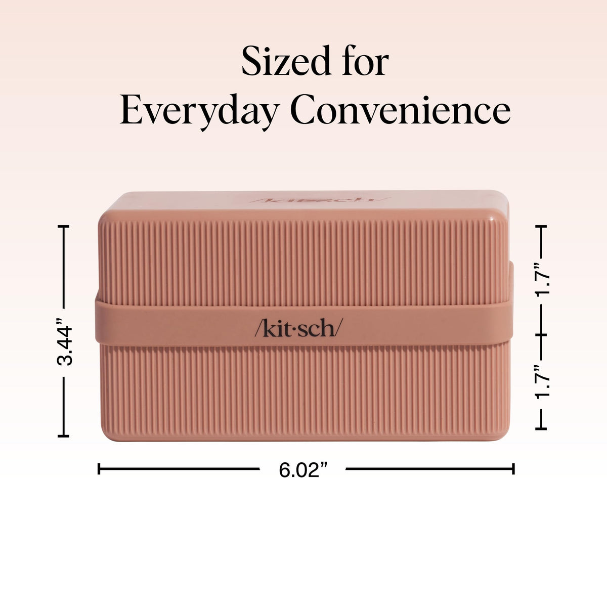 Kitsch held in hand showing compact scale for packing convenience