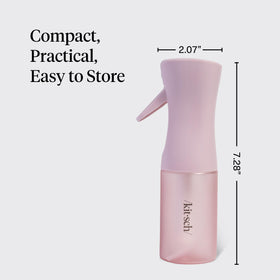 Kitsch held in hand to show 150ml size for portability and travel convenience