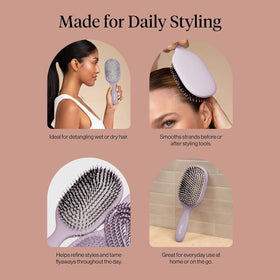 Kitsch brush held in hand to show size and convenient travel-friendly scale
