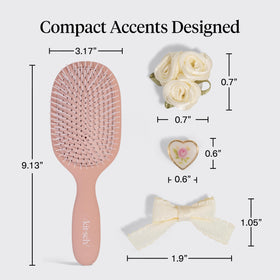 Kitsch brush used on wet hair demonstrating smooth detangling