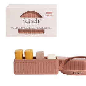 Kitsch top open displaying four compartments for organized storage