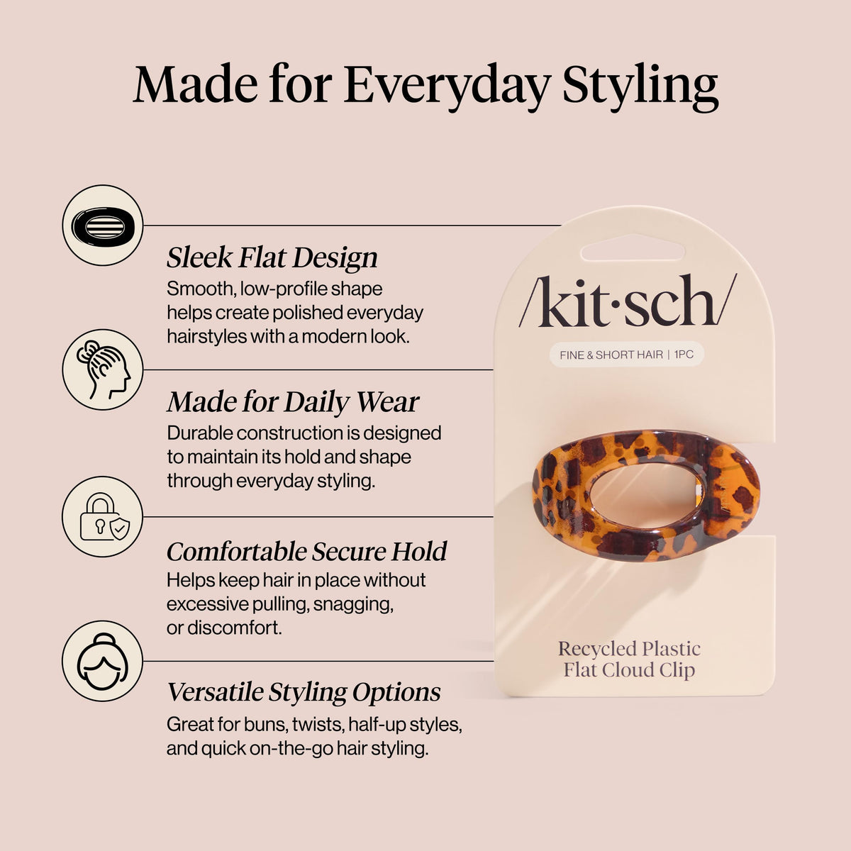 Kitsch tortoise clipped in half-up hair illustrating polished hairstyle