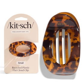 Kitsch tortoise inside a beach bag showing lightweight travel convenience