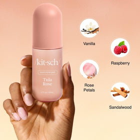 Kitsch Tula Rose held in hand to show compact travel size and easy portability
