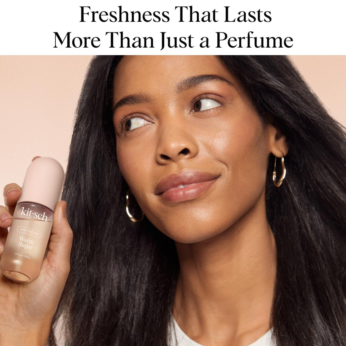 Kitsch mist dispersing on hair strands delivering quick deodorizing benefit