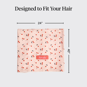 Kitsch on model with long hair illustrating roomy coverage and reduced frizz