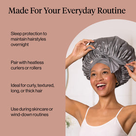 Model wearing Kitsch bonnet on curly hair to maintain moisture and reduce frizz