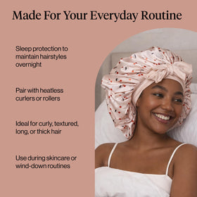 Kitsch bonnet beside hair rollers showing compatibility with heatless styling