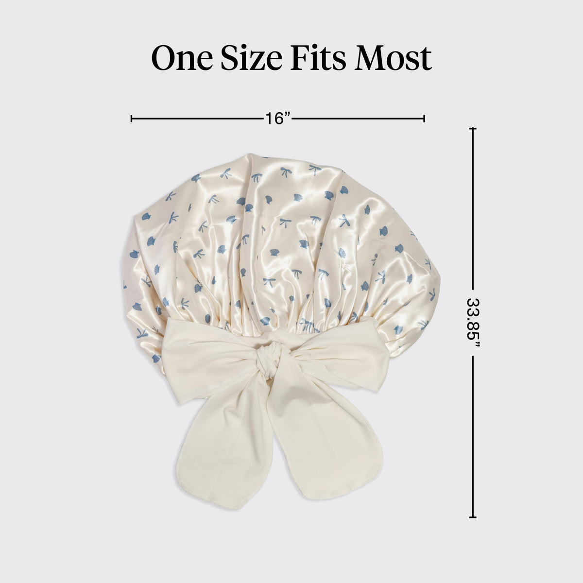 Kitsch bonnet worn with high bun demonstrating XL capacity benefit: protects large styles comfortably