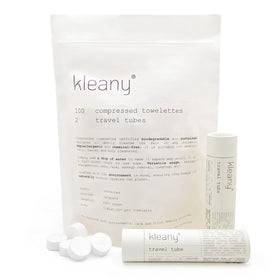 Kleany front packaging showing 100 compressed towel tablets and compact box benefit portability