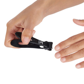 KLIPP in use by a senior trimming a toenail demonstrating easier control