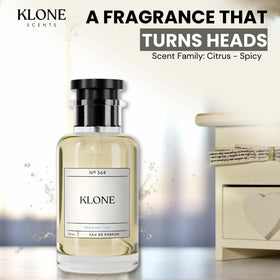 Klone fragrance poured beside citrus to show fresh bright top notes