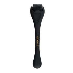 Koi Beauty derma roller front view showing jet black handle and roller for precise use