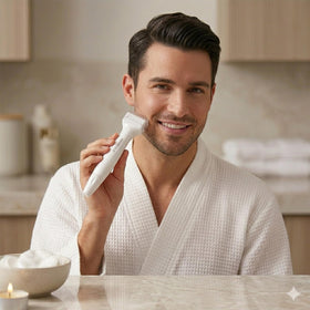 Koi Beauty derma stamp next to a hand showing compact size and travel convenience