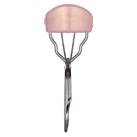 Koji curler in use on an eyelid demonstrating even lash separation and lift