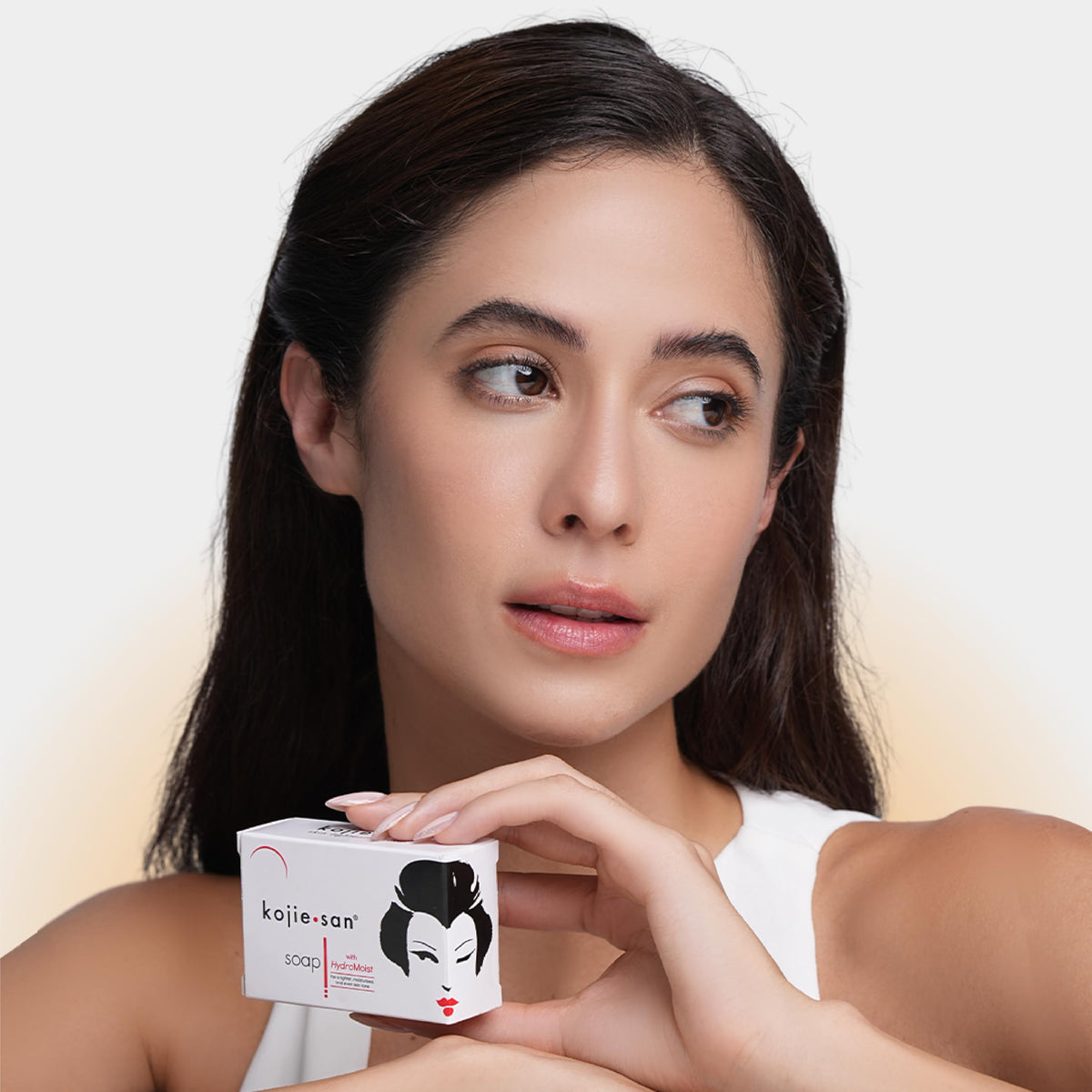 Kojie San applied to face demonstrating gentle use and brighter-looking skin