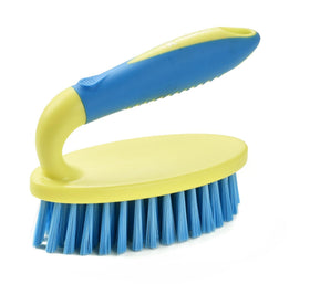 Koksi stiff bristle close-up removing grout buildup for deep cleaning power