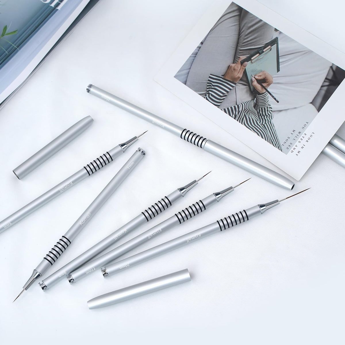 Komall brushes arranged on a salon table conveying professional results and workflow