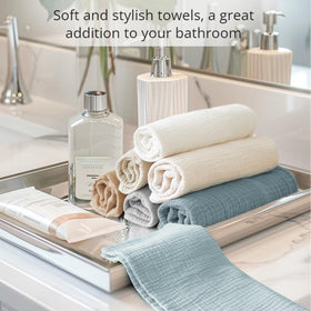 Konssy stack of seven folded towels demonstrating set rotation benefit