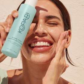 Kopari cleanser on bathroom shelf in lifestyle scene showing daily routine use