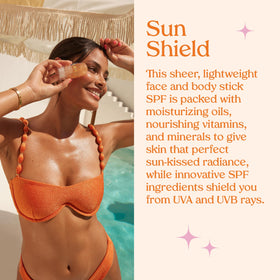 Kopari sunscreen stick held in hand to show 1 oz size and convenient portability