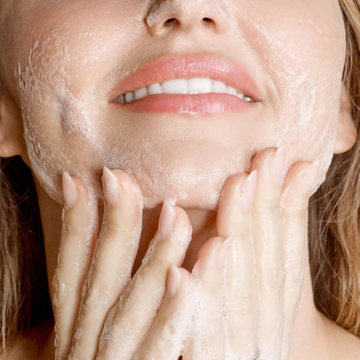 KORA Organics foam on hand illustrating texture and easy application