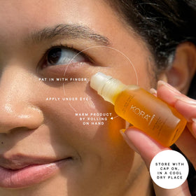 KORA Organics rose quartz roller detail providing a cooling massage benefit