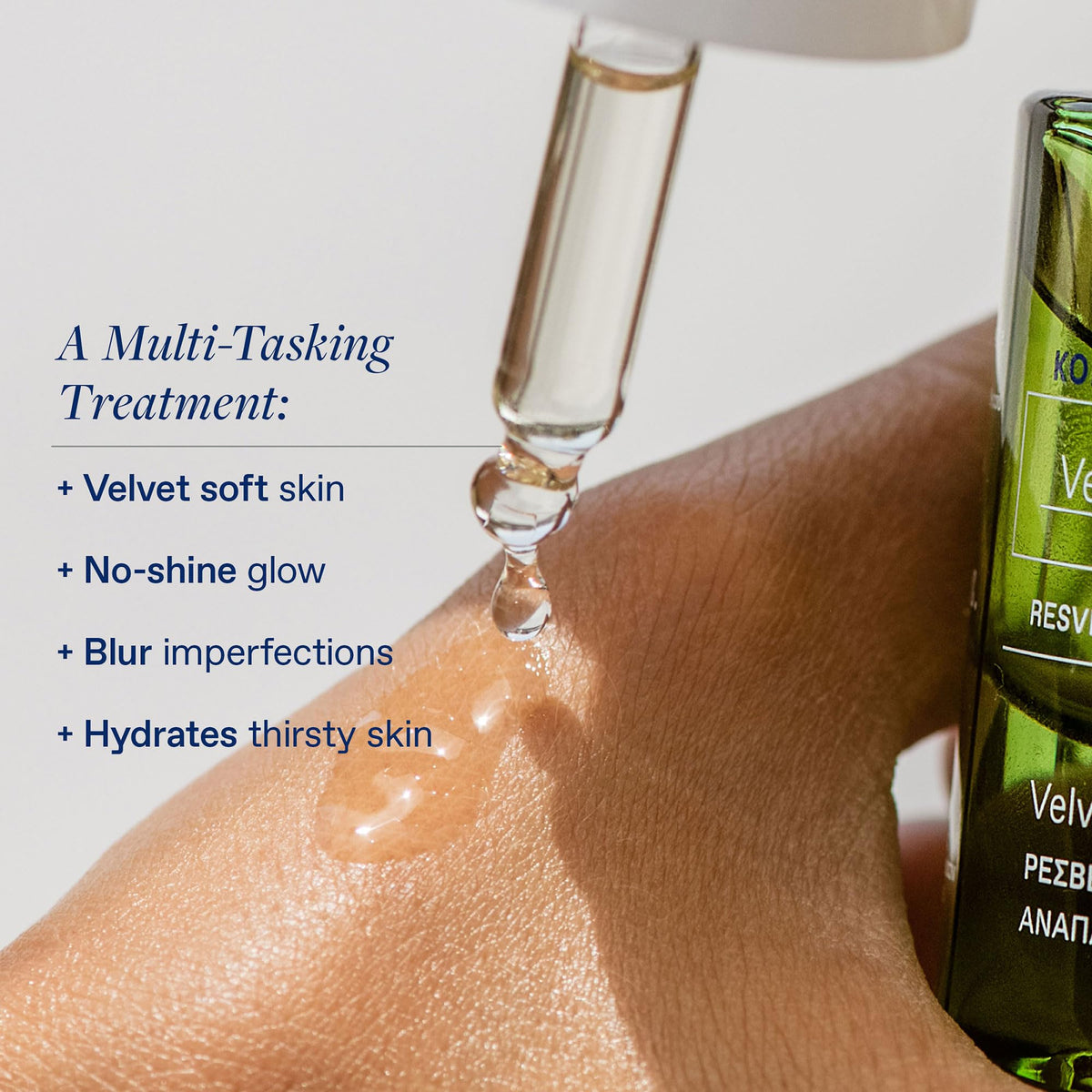 KORRES model applying oil to cheek, demonstrating smooth finish benefit
