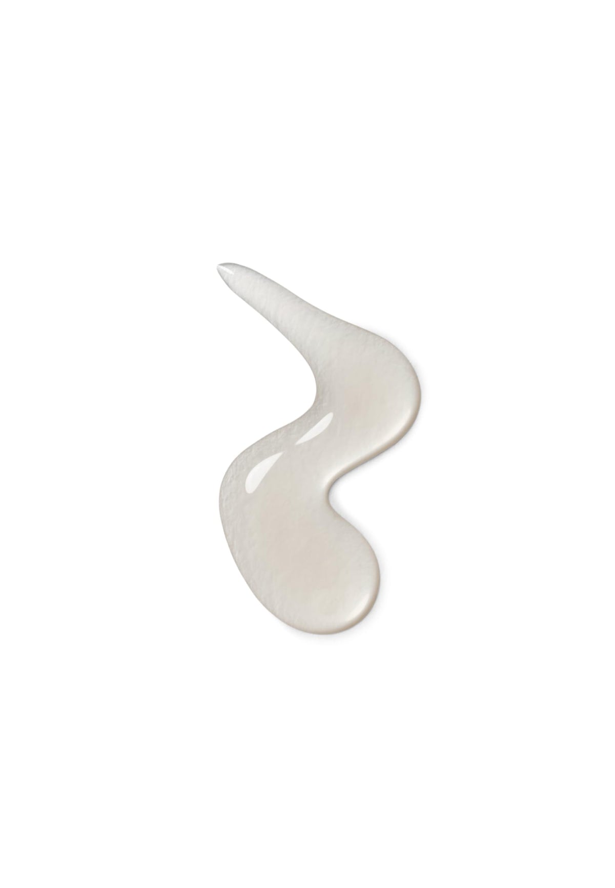 KORRES product beside coin showing compact travel‑friendly size